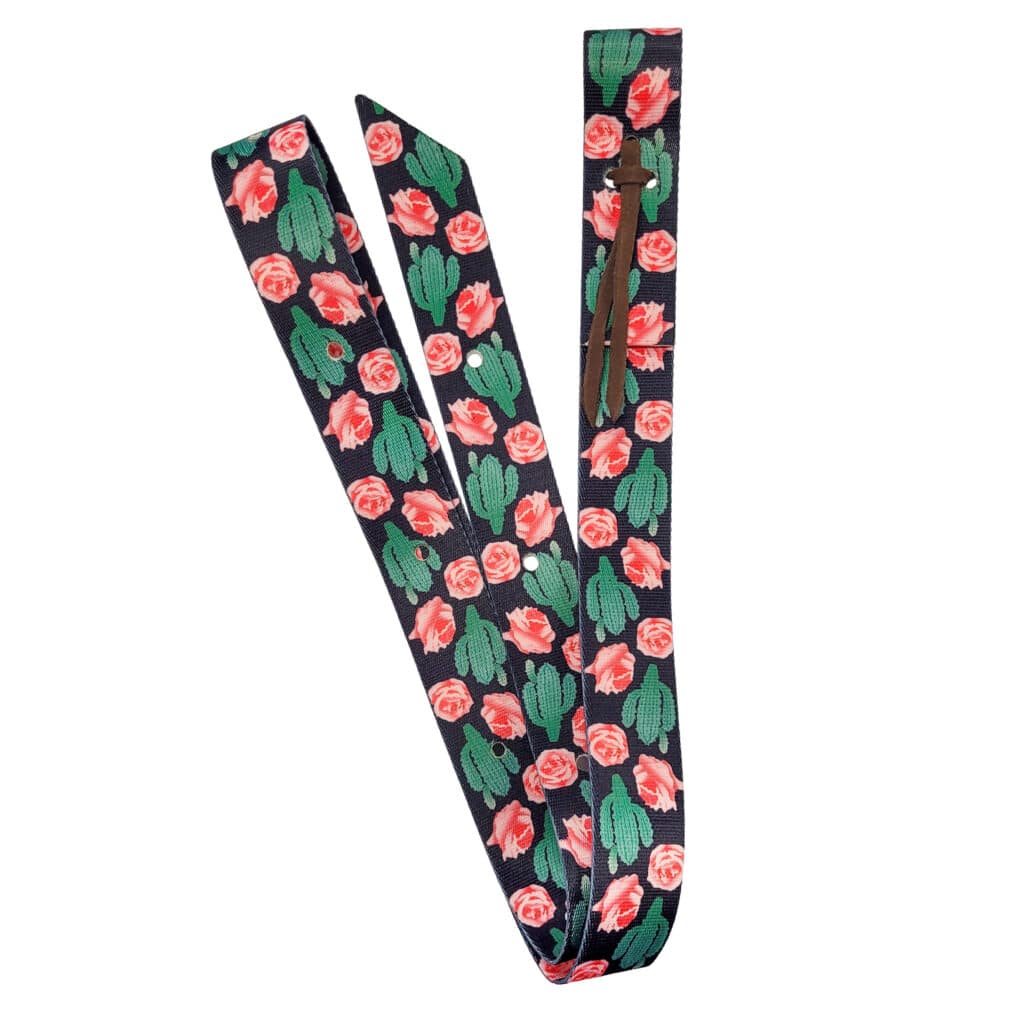 Brighten up your Western tack with a Patterned Nylon Saddle Tie Strap. Made from durable premium nylon webbing and available in a selection of trendy designs, it combines dependable everyday function with an eye-catching finish. A leather tie is included for secure attachment to the saddle.